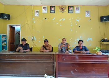 Bhabinkamtibmas Desa Lombong Timur Laksanakan Pengamanan Penyaluran Bantuan Pangan CBP 2025