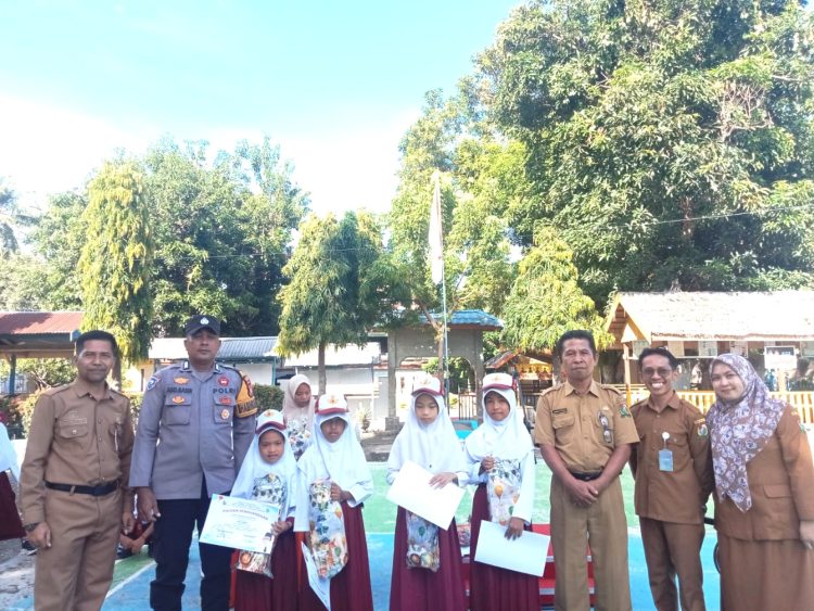 Bhabinkamtibmas Polsek Malunda Jadi Pembina Upacara, Tanamkan Anti-Bullying Sejak Dini di SDN 03 Mosso