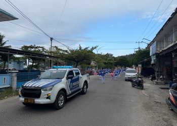 Jamin Kelancaran Kegiatan, Satlantas Polres Majene Kawal Jalan Santai Dies Natalis STIKes Bina Bangsa